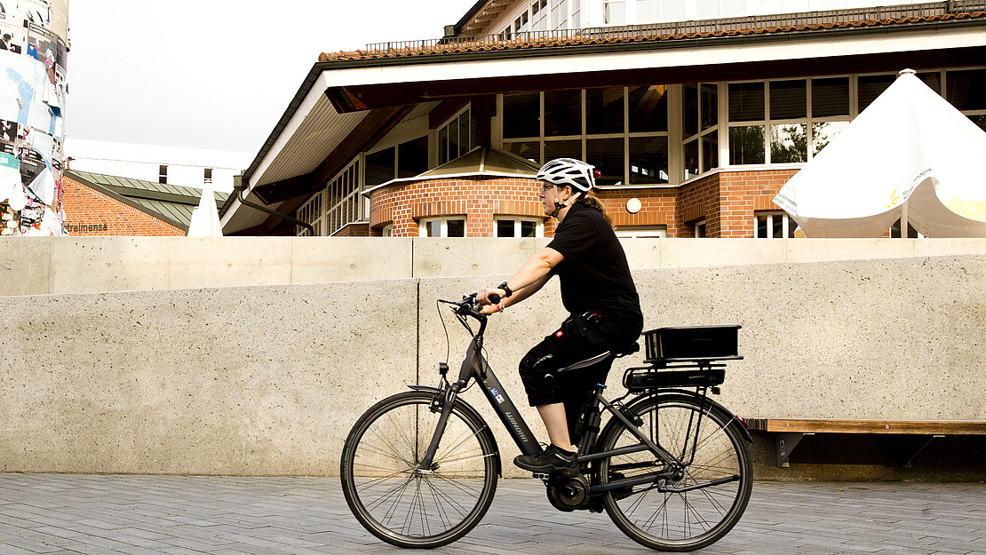 The photo shows a cyclist