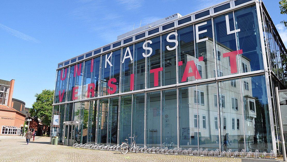 The photo shows a building of the University of Kassel