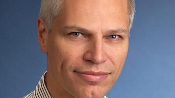 The photo shows Prof. Dr. Andreas Ziegler